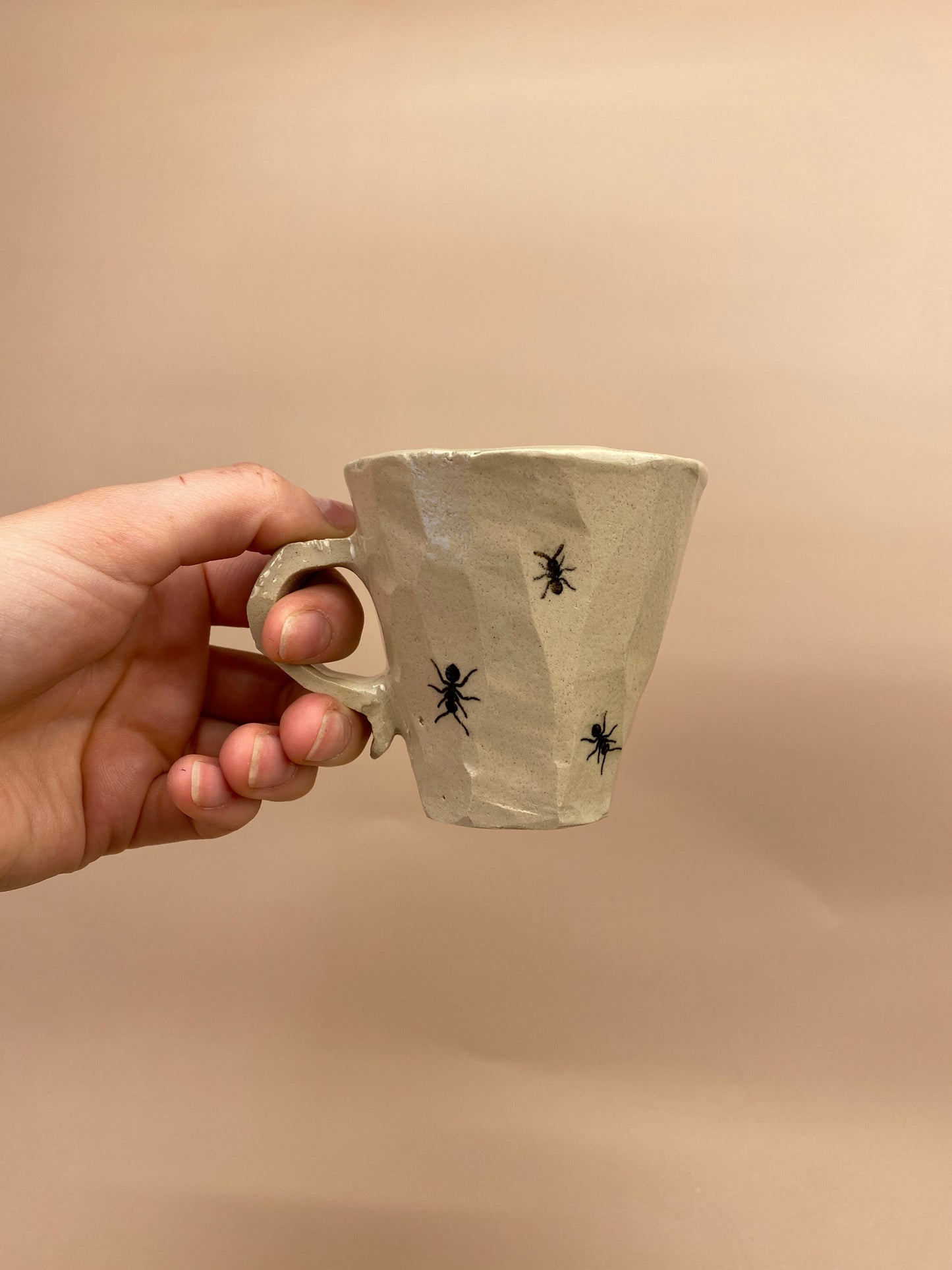 Espresso cup with ants