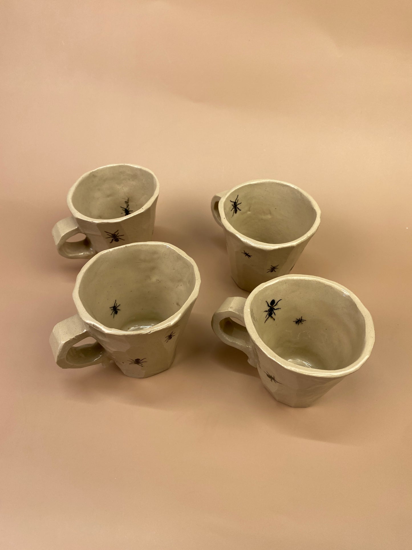 Espresso cup with ants