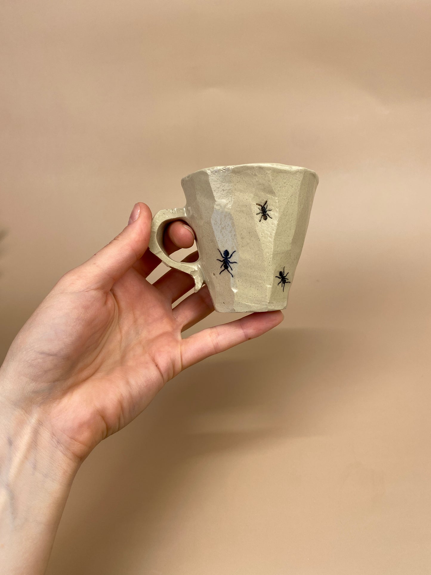 Espresso cup with ants