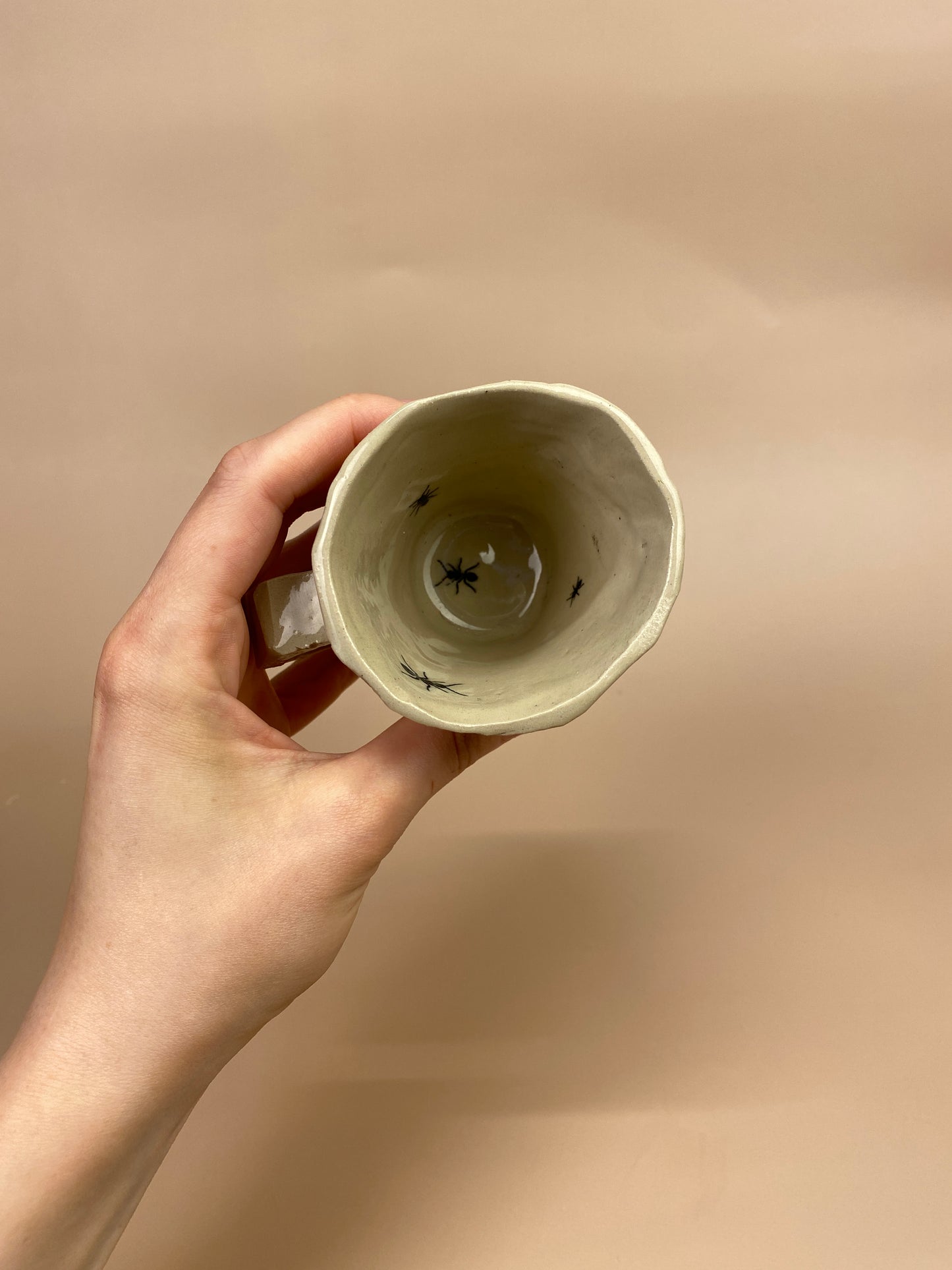 Espresso cup with ants