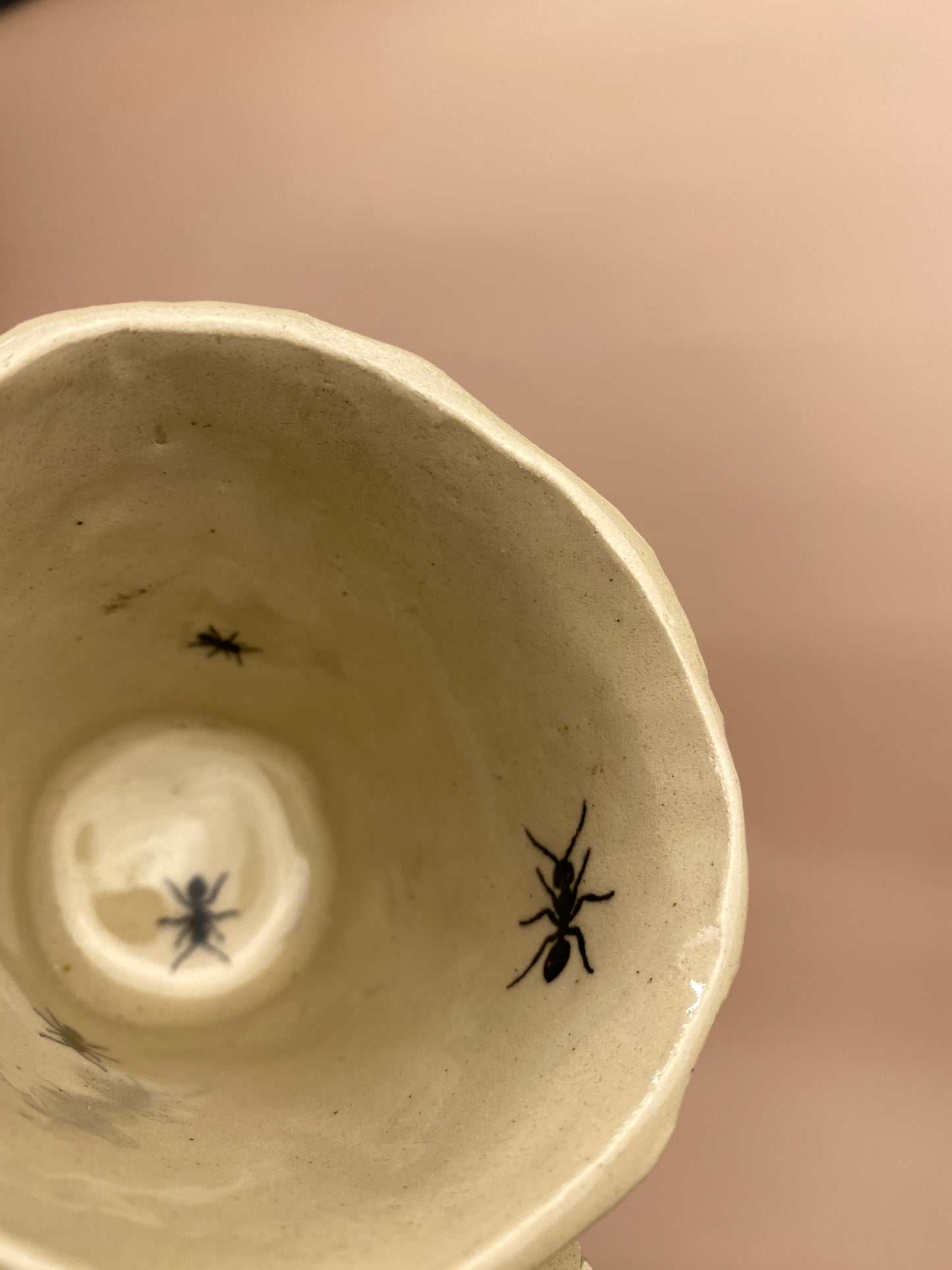 Espresso cup with ants