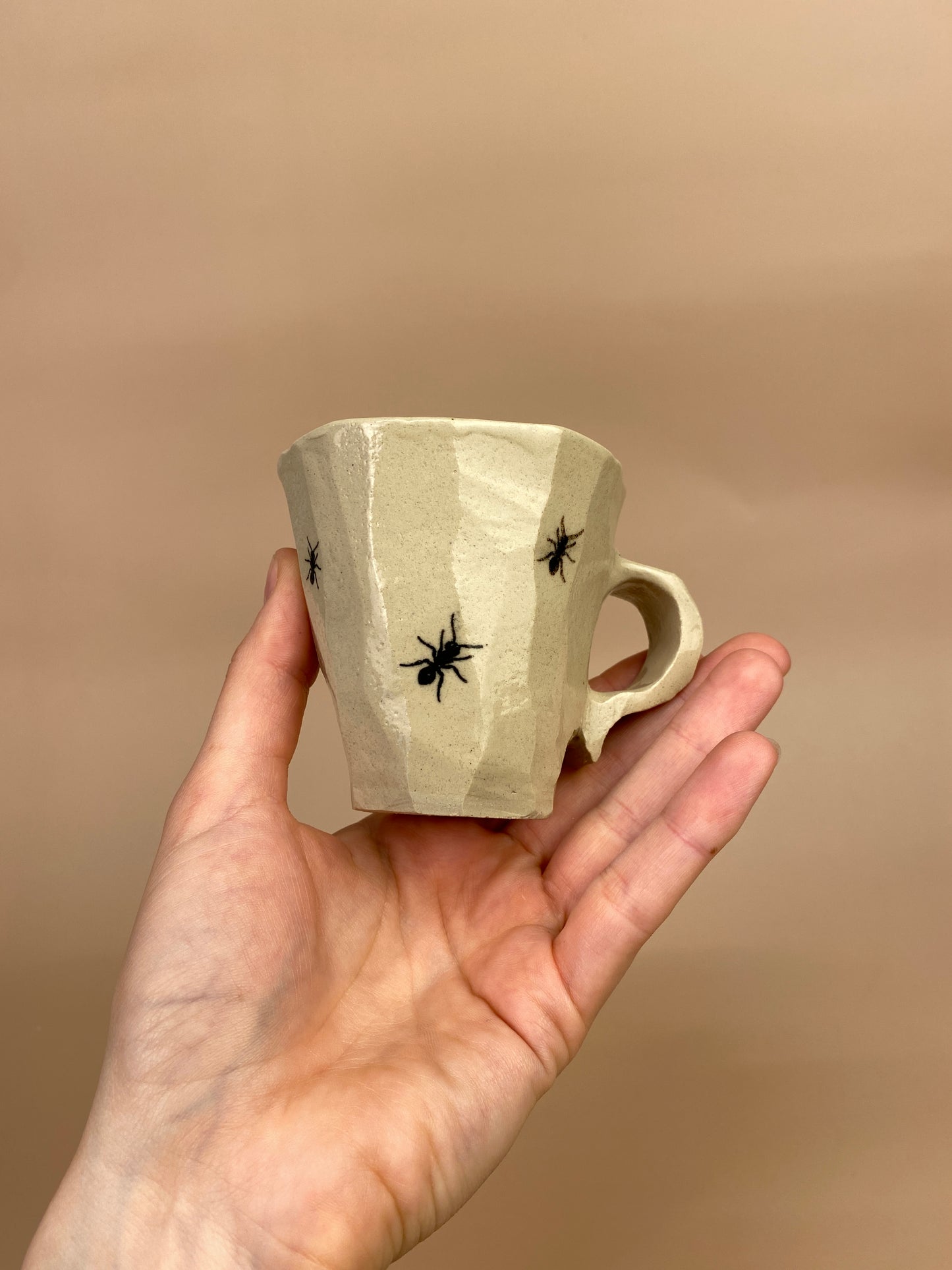 Espresso cup with ants